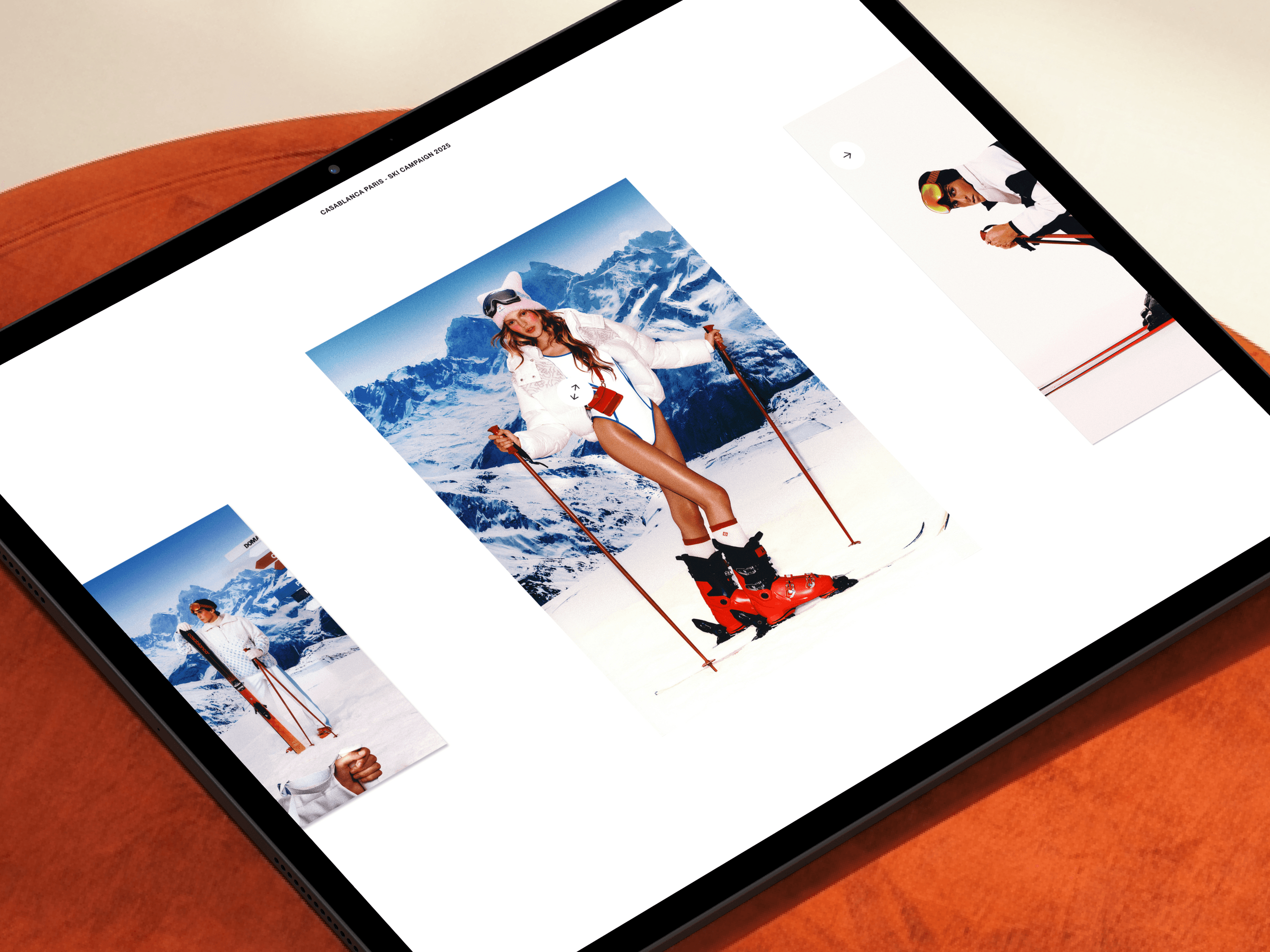 Tablet showing the Casablanca Paris ski campaign project page, with a large alpine fashion shot flanked by smaller campaign images.