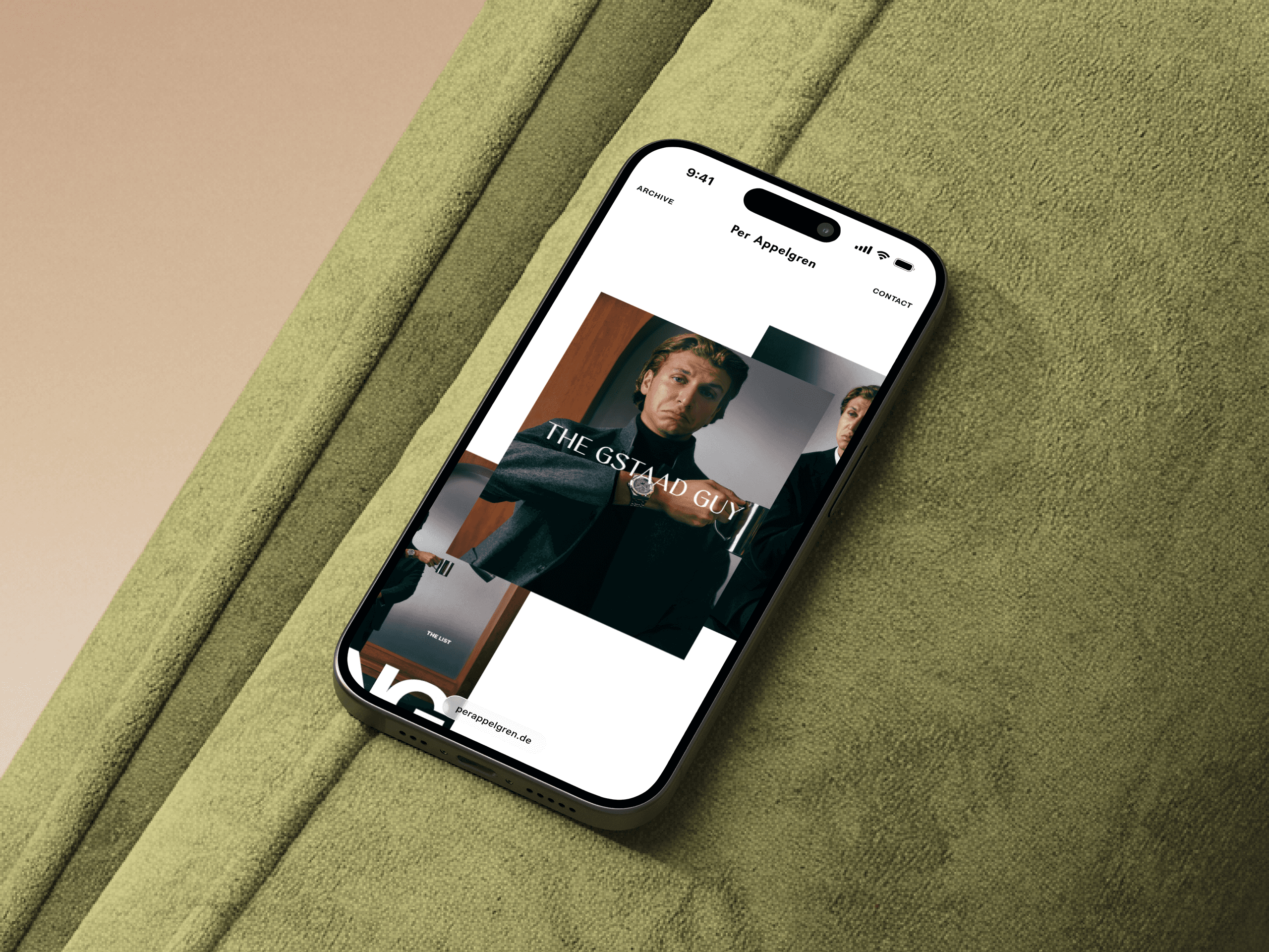 Smartphone on a green sofa showing the mobile version of the site with The Gstaad Guy editorial images layered on screen.